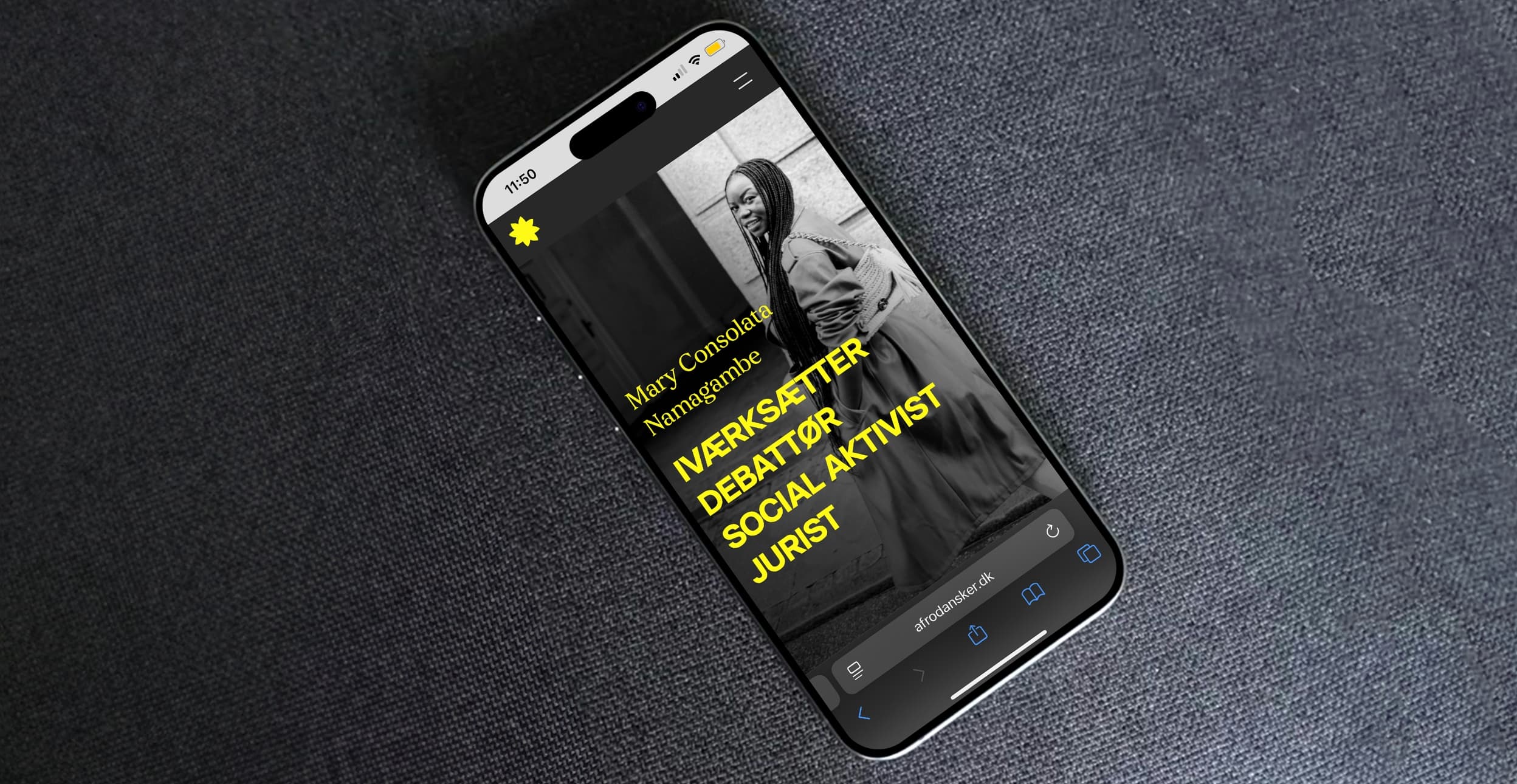 Phone showing the landing page of the website